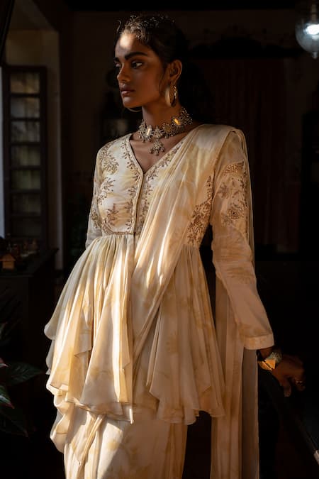 Paulmi And Harsh Ivory Crepe Zari, Embroidery Pre-stitched Saree With Embellished Peplum Top Online at Aza Fashions Paulmi And Harsh_Ivory Crepe Zari, Embroidery Pre-stitched Saree With Embellished Peplum Top _Online_at_Aza_Fashions
