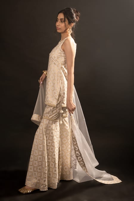 Shop_Monk & Mei By Sonia Anand_Gold Silk, Brocade Embroidery, Lace Round Neck Floral Pattern Kurta Sharara Set 