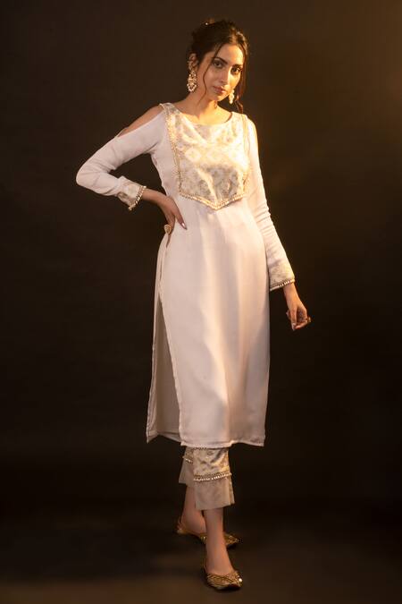 Monk & Mei By Sonia Anand Gold Silk, Brocade Pearls Boat Neck Emily Cold-shoulder Kurta Pant Set at Aza Fashions Monk & Mei By Sonia Anand_Gold Silk, Brocade Pearls Boat Neck Emily Cold-shoulder Kurta Pant Set _at_Aza_Fashions