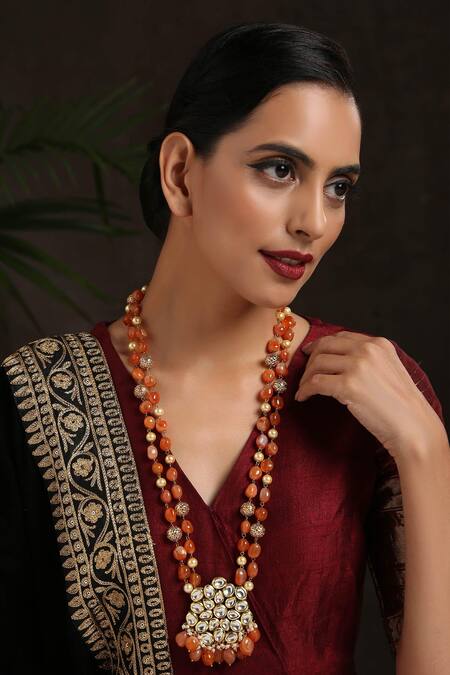 Buy Paisley Pop Gold Plated Stone Orange Kundan Pendant Necklace at Aza Fashions Buy_Paisley Pop_Gold Plated Stone Orange Kundan Pendant Necklace_at_Aza_Fashions