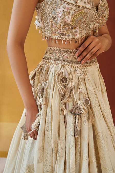 Buy Priyanka Singh Ivory Cotton, Organza Zari, Sequins, Tassels Embroidered Blouse And Lehenga Set Online at Aza Fashions Buy_Priyanka Singh_Ivory Cotton, Organza Zari, Sequins, Tassels Embroidered Blouse And Lehenga Set _Online_at_Aza_Fashions