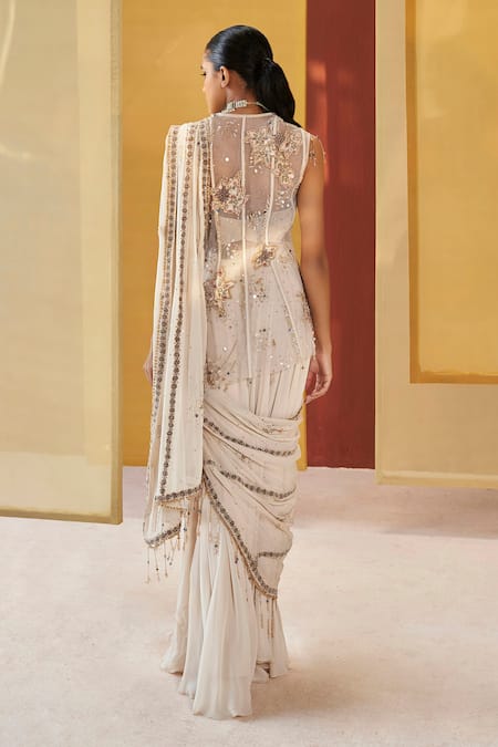 Shop Priyanka Singh Ivory Net, Georgette Sequins, Zari Pre-draped Zardozi Embroidered Saree With Top at Aza Fashions Shop_Priyanka Singh_Ivory Net, Georgette Sequins, Zari Pre-draped Zardozi Embroidered Saree With Top _at_Aza_Fashions