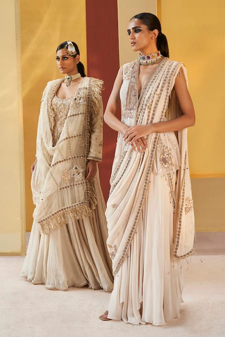 Priyanka Singh Ivory Net, Georgette Sequins, Zari Pre-draped Zardozi Embroidered Saree With Top at Aza Fashions Priyanka Singh_Ivory Net, Georgette Sequins, Zari Pre-draped Zardozi Embroidered Saree With Top _at_Aza_Fashions