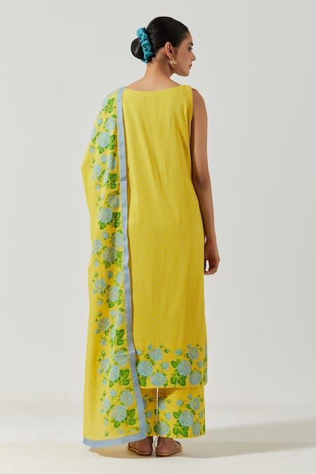 Shop Label Earthen Yellow Cotton Mul Floral Round Detailing Kurta Set at Aza Fashions Shop_Label Earthen_Yellow Cotton Mul Floral Round Detailing Kurta Set _at_Aza_Fashions