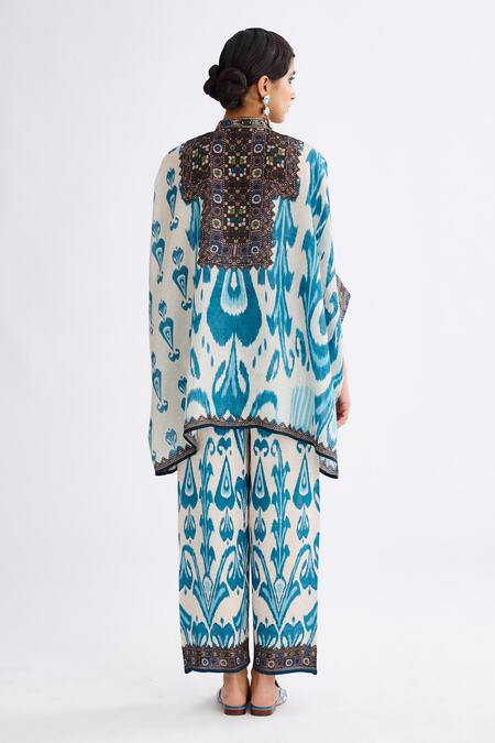 Shop Rajdeep Ranawat Blue Satin Permaz Printed Straight Pant at Aza Fashions Shop_Rajdeep Ranawat_Blue Satin Permaz Printed Straight Pant_at_Aza_Fashions