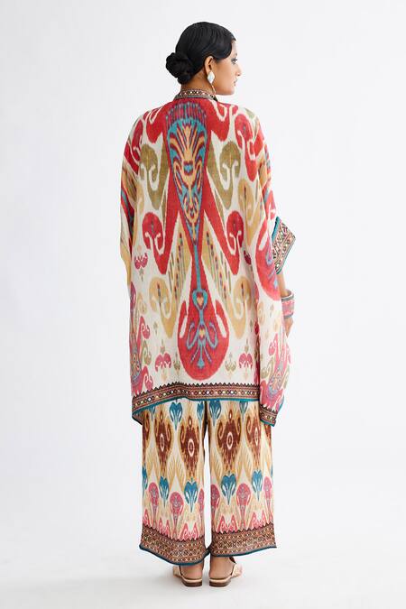 Shop Rajdeep Ranawat Pink Silk Embroidery Bandeau Neck Chanel Abstract Print Tunic at Aza Fashions Shop_Rajdeep Ranawat_Pink Silk Embroidery Bandeau Neck Chanel Abstract Print Tunic_at_Aza_Fashions