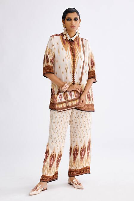 Rajdeep Ranawat_Brown Satin Permaz Abstract Pattern Pant_at_Aza_Fashions