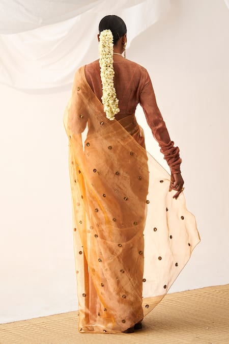 Shop Itrh Peach Tissue Gota Patti Plunge Neck Ghunghroo Embellished Saree With Blouse at Aza Fashions Shop_Itrh_Peach Tissue Gota Patti Plunge Neck Ghunghroo Embellished Saree With Blouse _at_Aza_Fashions