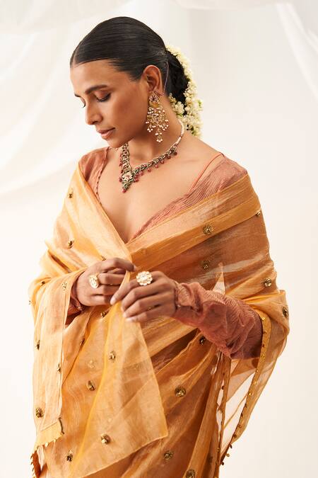 Shop Itrh Peach Tissue Gota Patti Plunge Neck Ghunghroo Embellished Saree With Blouse Online at Aza Fashions Shop_Itrh_Peach Tissue Gota Patti Plunge Neck Ghunghroo Embellished Saree With Blouse _Online_at_Aza_Fashions