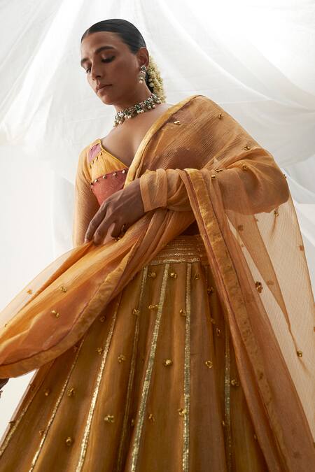 Itrh Yellow Tissue Gota Patti Plunge Neck Ghunghroo Embellished Lehenga Set Online at Aza Fashions Itrh_Yellow Tissue Gota Patti Plunge Neck Ghunghroo Embellished Lehenga Set _Online_at_Aza_Fashions