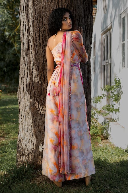 Shop 17:17 By Simmi Saboo Red Muslin Paint Brush Effect Asymmetric Neck Pleased Jumpsuit And Drape Set at Aza Fashions Shop_17:17 By Simmi Saboo_Red Muslin Paint Brush Effect Asymmetric Neck Pleased Jumpsuit And Drape Set _at_Aza_Fashions