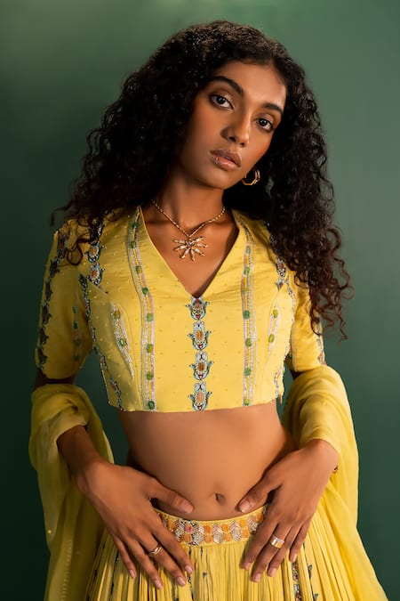 Buy 17:17 By Simmi Saboo Yellow Muslin Embroidered Cutdana V Neck Ariana Evil Eye Print Lehenga Set Online at Aza Fashions Buy_17:17 By Simmi Saboo_Yellow Muslin Embroidered Cutdana V Neck Ariana Evil Eye Print Lehenga Set _Online_at_Aza_Fashions