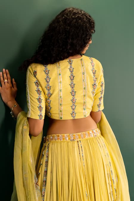 Shop 17:17 By Simmi Saboo Yellow Muslin Embroidered Cutdana V Neck Ariana Evil Eye Print Lehenga Set Online at Aza Fashions Shop_17:17 By Simmi Saboo_Yellow Muslin Embroidered Cutdana V Neck Ariana Evil Eye Print Lehenga Set _Online_at_Aza_Fashions
