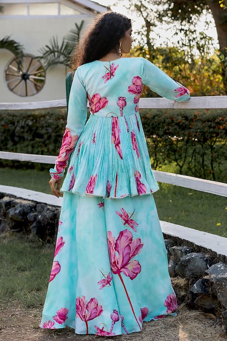 Shop 17:17 By Simmi Saboo Blue Muslin Round Neck Dimah Peplum Top And Gharara Set at Aza Fashions Shop_17:17 By Simmi Saboo_Blue Muslin Round Neck Dimah Peplum Top And Gharara Set _at_Aza_Fashions