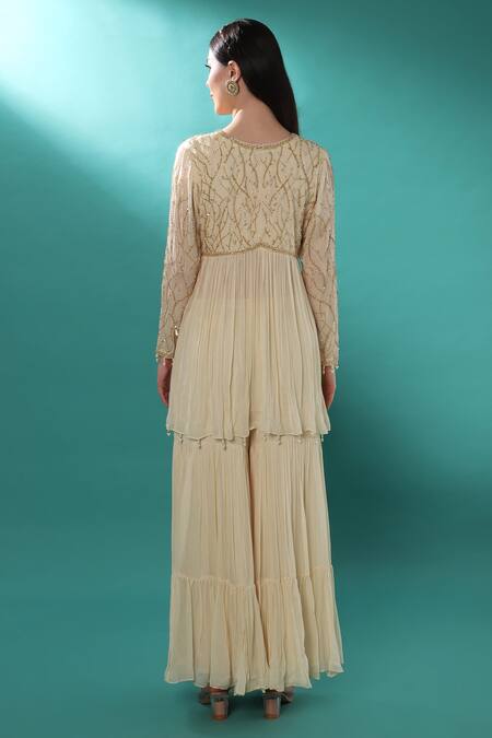 Shop_Bha Sha_Ivory Georgette, Net Pearls, Stones, Cut Bead Embellished Tunic Sharara Set _Online_at_Aza_Fashions