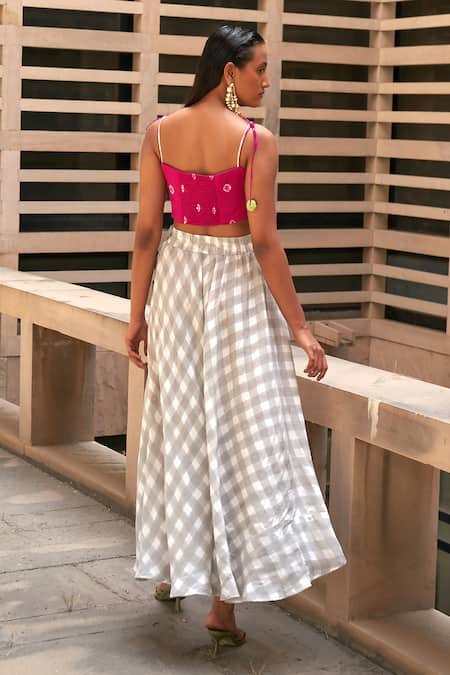 Shop Aapro Grey Modal, Satin, Silk Fabric Flowers Tie-up Bustier And Checkered Skirt Set at Aza Fashions Shop_Aapro_Grey Modal, Satin, Silk Fabric Flowers Tie-up Bustier And Checkered Skirt Set _at_Aza_Fashions