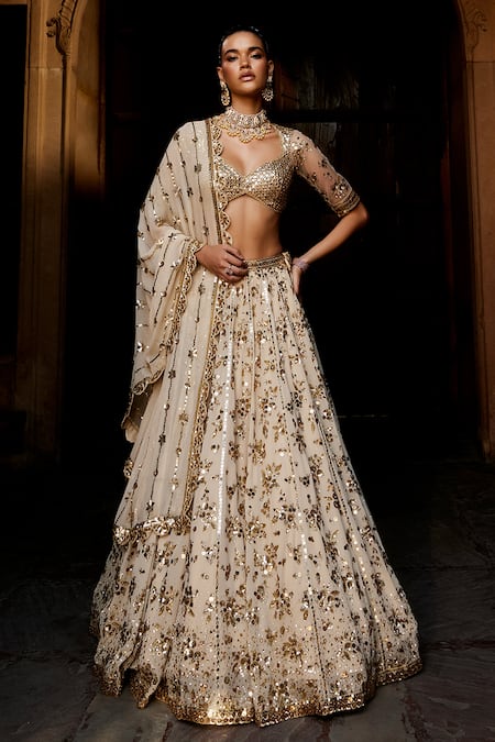 Prevasu_Gold Georgette Sequins V-neck Embroidered Bridal Lehenga Set _Online_at_Aza_Fashions