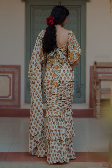 Shop Baaro Masi Yellow Muslin Embroidery Flower Bloom Print Pre-draped Saree With Blouse at Aza Fashions Shop_Baaro Masi_Yellow Muslin Embroidery Flower Bloom Print Pre-draped Saree With Blouse _at_Aza_Fashions