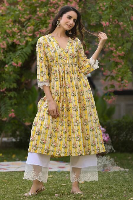 Charu Makkar_Yellow Cotton Embroidery V-neck Floral Print Kurta Set_at_Aza_Fashions