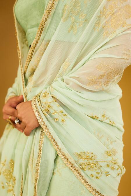 Shop Nikasha Green Silk Zari, Sequins, Diamonds, Floral Foil Print Saree And Blouse Set Online at Aza Fashions Shop_Nikasha_Green Silk Zari, Sequins, Diamonds, Floral Foil Print Saree And Blouse Set _Online_at_Aza_Fashions