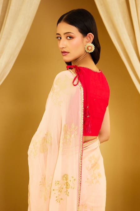 Shop Nikasha Peach Silk, Chiffon Sequins, Tassels Botanical Foil Print Saree With Blouse at Aza Fashions Shop_Nikasha_Peach Silk, Chiffon Sequins, Tassels Botanical Foil Print Saree With Blouse _at_Aza_Fashions
