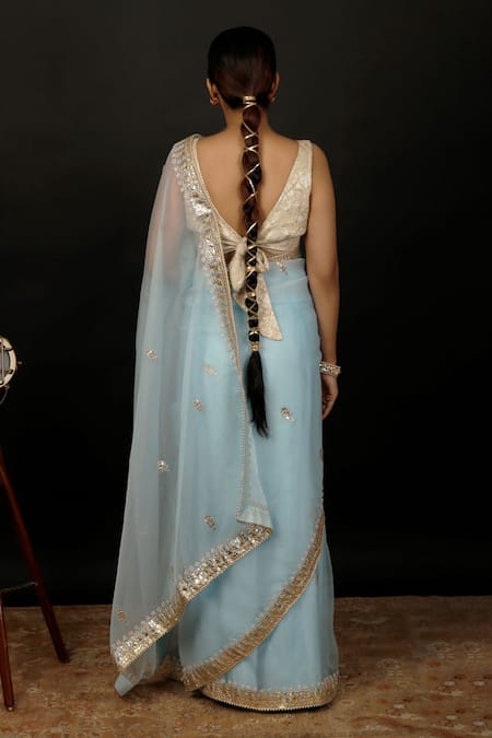 Shop Geroo Jaipur Sky Blue Organza Gota Patti Floral Work Saree With Unstitched Blouse Piece at Aza Fashions Shop_Geroo Jaipur_Sky Blue Organza Gota Patti Floral Work Saree With Unstitched Blouse Piece _at_Aza_Fashions
