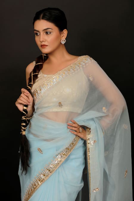 Shop Geroo Jaipur Sky Blue Organza Gota Patti Floral Work Saree With Unstitched Blouse Piece Online at Aza Fashions Shop_Geroo Jaipur_Sky Blue Organza Gota Patti Floral Work Saree With Unstitched Blouse Piece _Online_at_Aza_Fashions