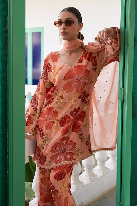 Shop Varun Bahl Peach Crepe, Georgette, Lurex, Muslin Floral Print Short Kurta Trouser Set at Aza Fashions Shop_Varun Bahl_Peach Crepe, Georgette, Lurex, Muslin Floral Print Short Kurta Trouser Set _at_Aza_Fashions