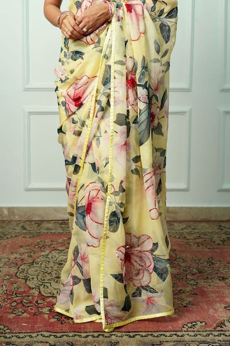 Buy_Atelier Shikaarbagh_Yellow Chiffon, Organza Uttara Floral Pattern Saree With Unstitched Blouse Piece _Online_at_Aza_Fashions