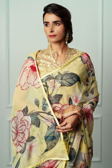 Shop_Atelier Shikaarbagh_Yellow Chiffon, Organza Uttara Floral Pattern Saree With Unstitched Blouse Piece _Online_at_Aza_Fashions