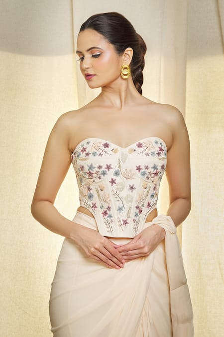 Vivek Patel Ivory Georgette Pearls, Sequins, Embroidery Ruffle Pre-draped Saree With Corset at Aza Fashions Vivek Patel_Ivory Georgette Pearls, Sequins, Embroidery Ruffle Pre-draped Saree With Corset _at_Aza_Fashions