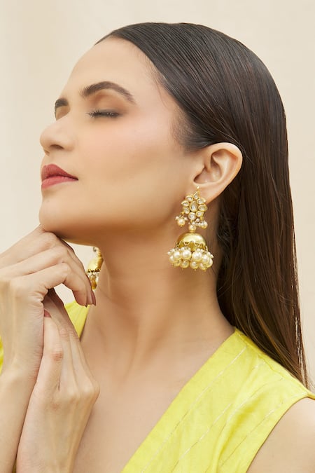 Buy Kista Gold Plated Pearl, Stone Floral Shaped Jhumkas at Aza Fashions Buy_Kista_Gold Plated Pearl, Stone Floral Shaped Jhumkas_at_Aza_Fashions