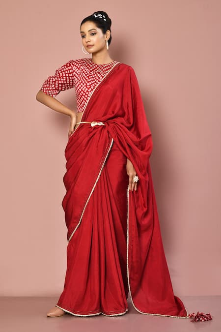 Buy Red Muslin Printed Round Solid Saree With Blouse For Women by Nazaakat  by Samara Singh Online at Aza Fashions.
