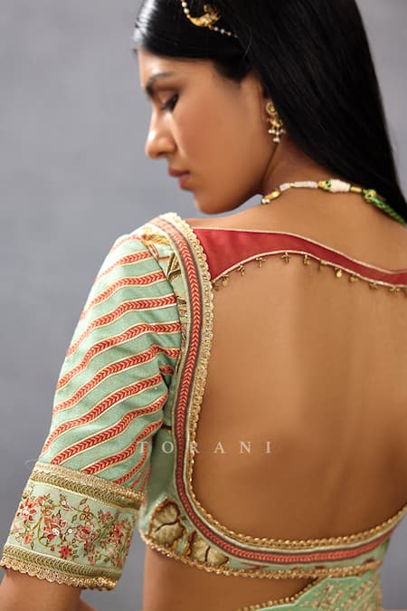 Torani Green Cotton, Silk Sequins, Lace V-neck Gul Neer Mahnaz Floral Pattern Blouse at Aza Fashions Torani_Green Cotton, Silk Sequins, Lace V-neck Gul Neer Mahnaz Floral Pattern Blouse _at_Aza_Fashions