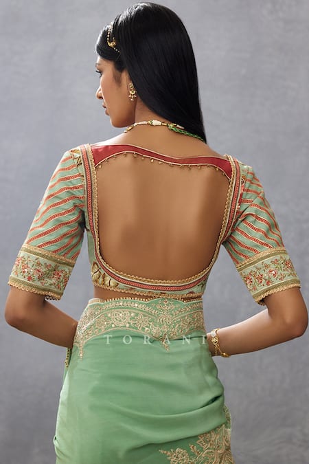 Shop Torani Green Cotton, Silk Sequins, Lace V-neck Gul Neer Mahnaz Floral Pattern Blouse at Aza Fashions Shop_Torani_Green Cotton, Silk Sequins, Lace V-neck Gul Neer Mahnaz Floral Pattern Blouse _at_Aza_Fashions