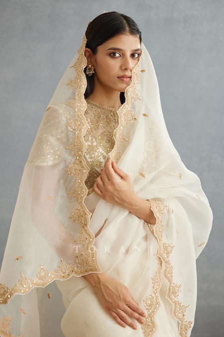 Torani Ivory Silk Organza Embroidery Gul Bano Nayantara Placement Saree at Aza Fashions Torani_Ivory Silk Organza Embroidery Gul Bano Nayantara Placement Saree _at_Aza_Fashions