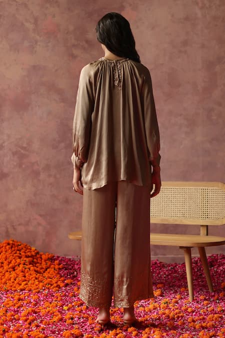 Shop Begum Gold Satin Cut Work, Sequins, Zari Round Champagne Embroidered Top And Pant Set at Aza Fashions Shop_Begum_Gold Satin Cut Work, Sequins, Zari Round Champagne Embroidered Top And Pant Set _at_Aza_Fashions