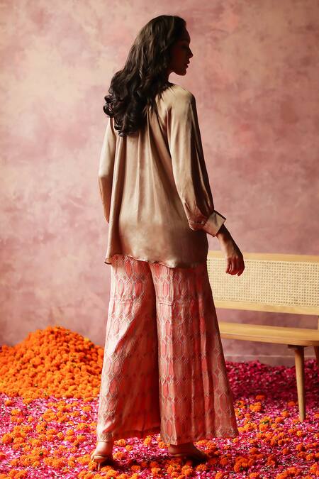 Shop Begum Gold Satin, Georgette Sequins, Zari Round Neck Rene Top And Embroidered Pant Set at Aza Fashions Shop_Begum_Gold Satin, Georgette Sequins, Zari Round Neck Rene Top And Embroidered Pant Set_at_Aza_Fashions