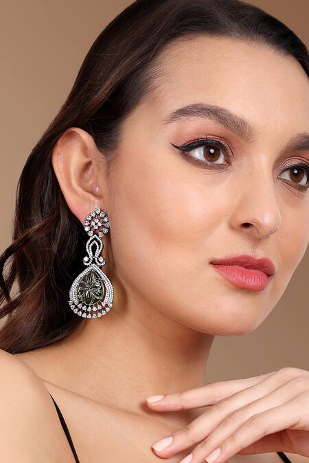 Buy Tizora White Faux Diamonds And Carved Stones Studded Earrings at Aza Fashions Buy_Tizora_White Faux Diamonds And Carved Stones Studded Earrings_at_Aza_Fashions