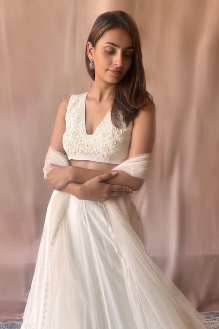 Shop Aakansha Gupta Ivory Silk, Organza, Net Embroidery, Cut Work, Floral Bridal Lehenga Set at Aza Fashions Shop_Aakansha Gupta_Ivory Silk, Organza, Net Embroidery, Cut Work, Floral Bridal Lehenga Set _at_Aza_Fashions