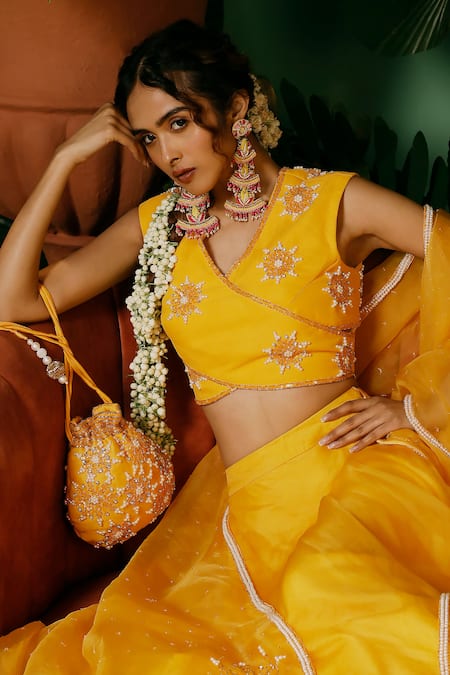Midushi Bajoria_Yellow Georgette, Organza Sequins, Pearls V-neck Embroidered Blouse Lehenga Set _Online_at_Aza_Fashions