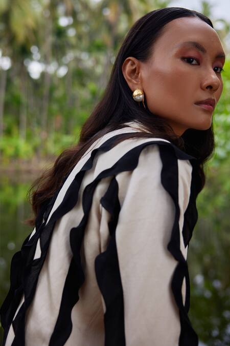 Buy_Twinkle Hanspal_Ivory Linen Satin Frill Notched Lapel Collar Evelyn Blazer And Pant Set_Online_at_Aza_Fashions