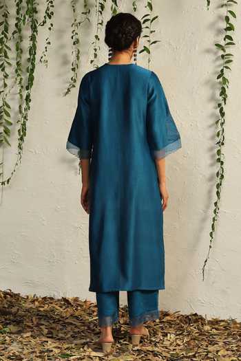 Shop Charkhee Blue Chanderi, Cotton Satin, Organza Cut Work, Leaf Embroidered Kurta Pant Set at Aza Fashions Shop_Charkhee_Blue Chanderi, Cotton Satin, Organza Cut Work, Leaf Embroidered Kurta Pant Set _at_Aza_Fashions