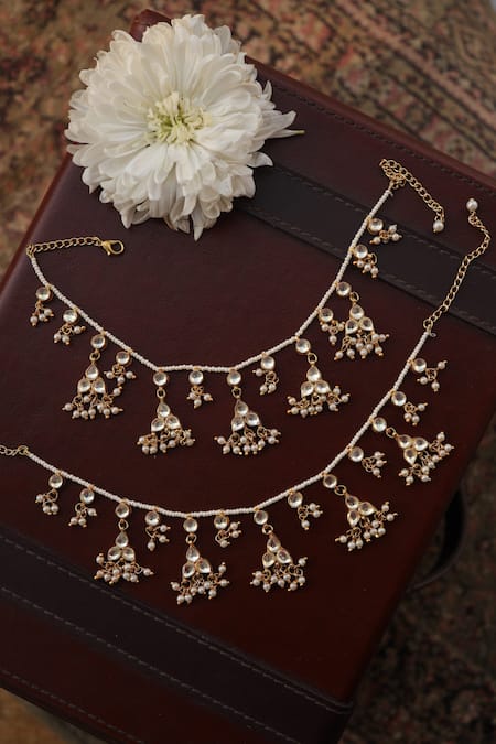 Shop_Paisley Pop_Gold Plated Pearls, Zari Kundan Embellished Anklets - Set Of 2 _at_Aza_Fashions