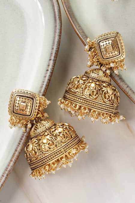 Shop_Curio Cottage_Gold Plated Embellished Handcrafted Carved Jhumka_at_Aza_Fashions