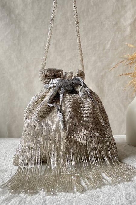 Kreivo by Vamanshi Damania Silver Cutdana Silk Embellished Potli Bag 