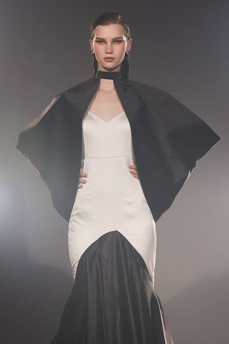 Manika Nanda Black German Satin Solid Gown Natasha Flounce With Batwing Drape Online at Aza Fashions Manika Nanda_Black German Satin Solid Gown Natasha Flounce With Batwing Drape _Online_at_Aza_Fashions