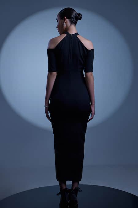 Manika Nanda_Black Crepe, Satin Turtle Neck Naomi Cocktail Column Dress _at_Aza_Fashions
