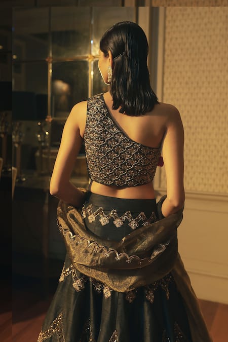 Shop Ojasmé By Sanjana Thapa Black Silk, Organza, Tissue Beads, Embroidery Asymmetric Scallop Lehenga Set at Aza Fashions Shop_Ojasmé By Sanjana Thapa_Black Silk, Organza, Tissue Beads, Embroidery Asymmetric Scallop Lehenga Set _at_Aza_Fashions
