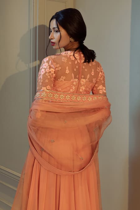 Shop Ojasmé By Sanjana Thapa Peach Net, Georgette, Silk Organza Embroidery, Lehenga And Wildflower Blouse Set at Aza Fashions Shop_Ojasmé By Sanjana Thapa_Peach Net, Georgette, Silk Organza Embroidery, Lehenga And Wildflower Blouse Set _at_Aza_Fashions
